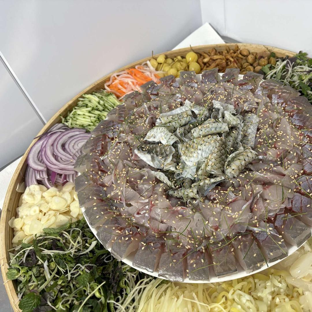 梁记横县鱼生南丹店