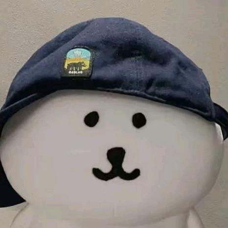 喆.